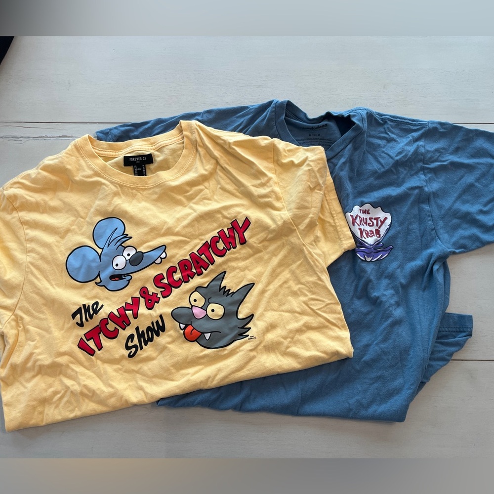 2 X Graphic Tees size Med (one price for both)